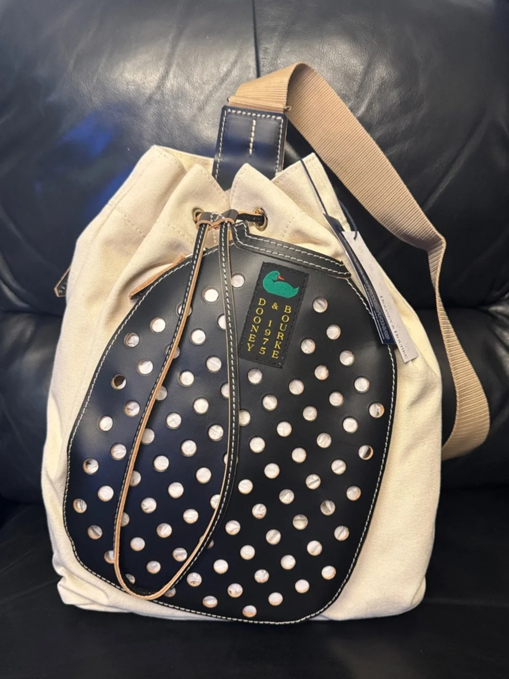 Dooney & Bourke Canvas And Leather Pickleball Sling Bag, Color Cream/Black - Picture 5 of 11